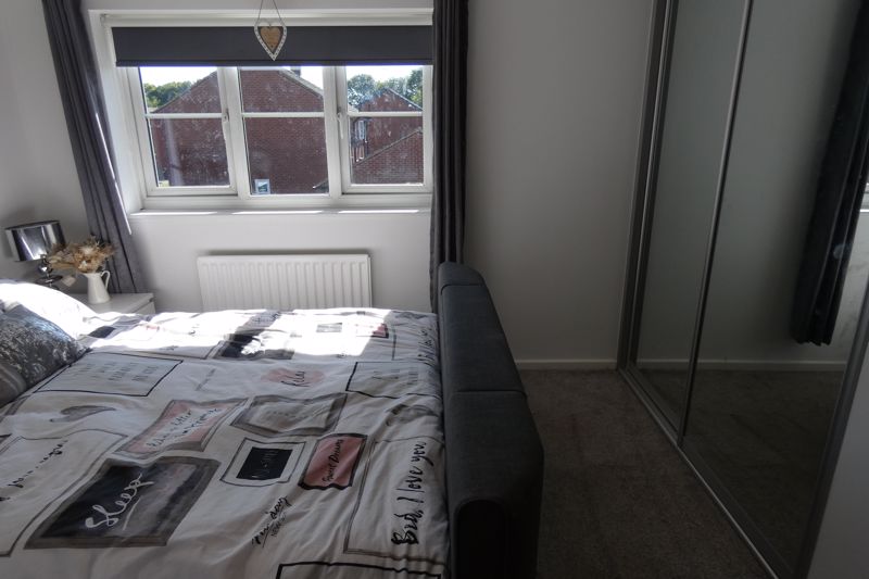 Bedroom One- click for photo gallery